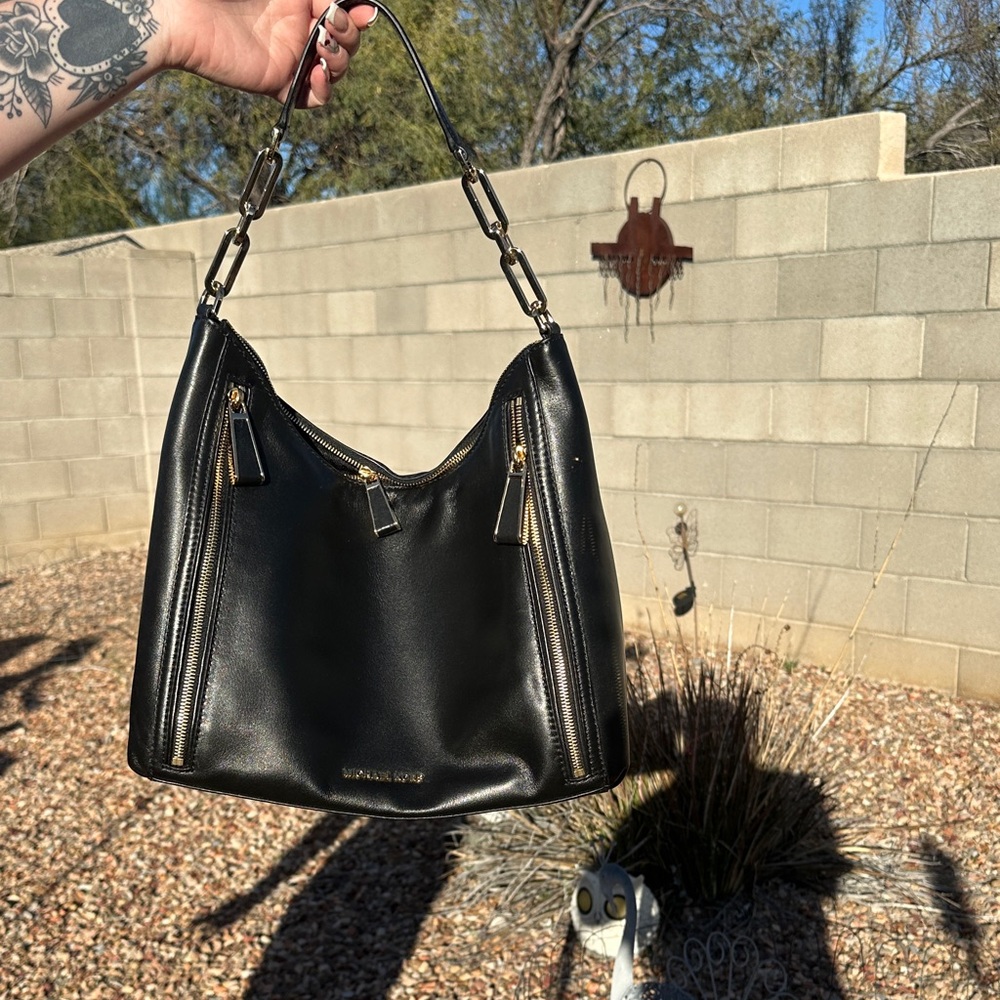 Michael Kors Black Hobo Bag with Gold Accents